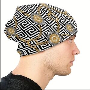 Geometric Black and White Beanie with Gold Chain Pattern